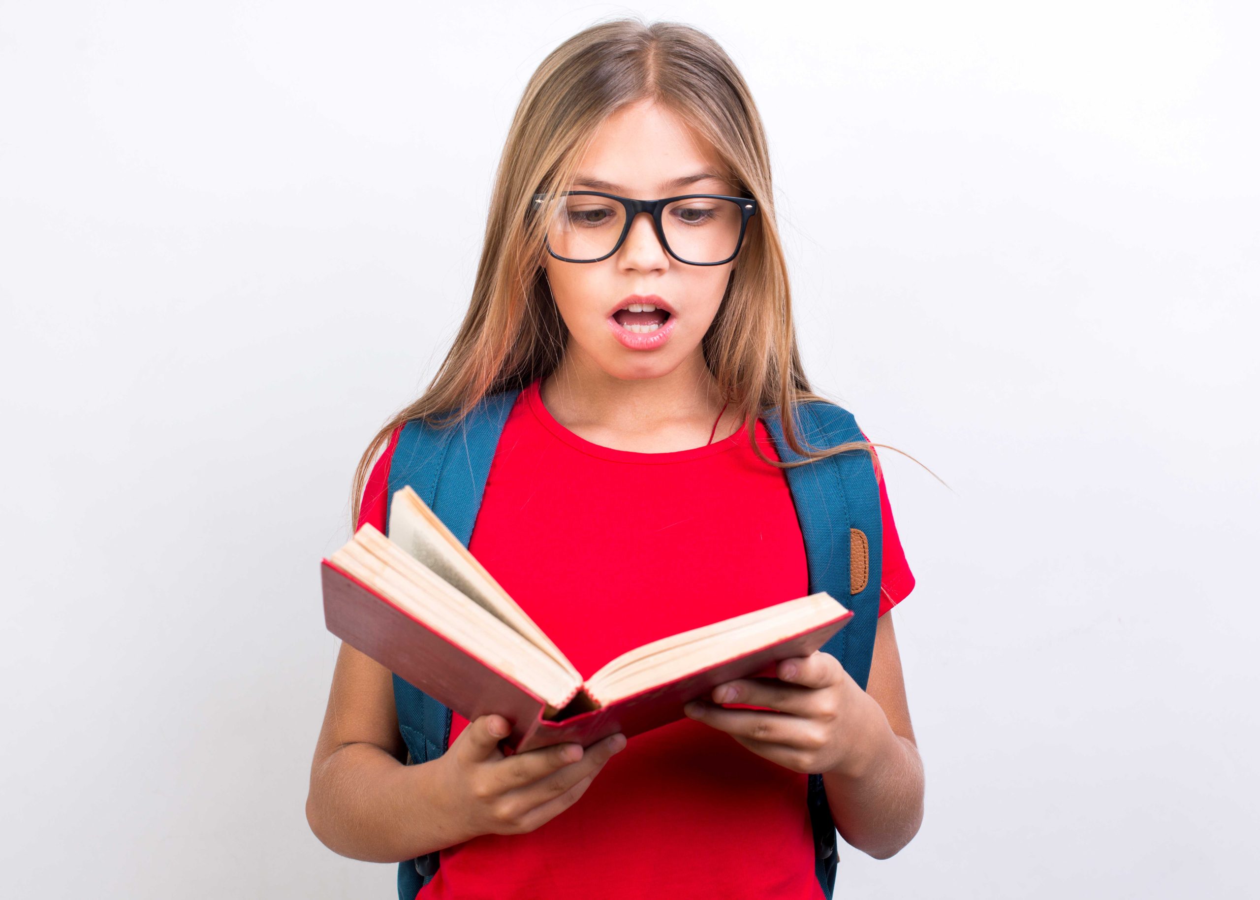 Graphic showing a girl with Myopia reading a book with Specs